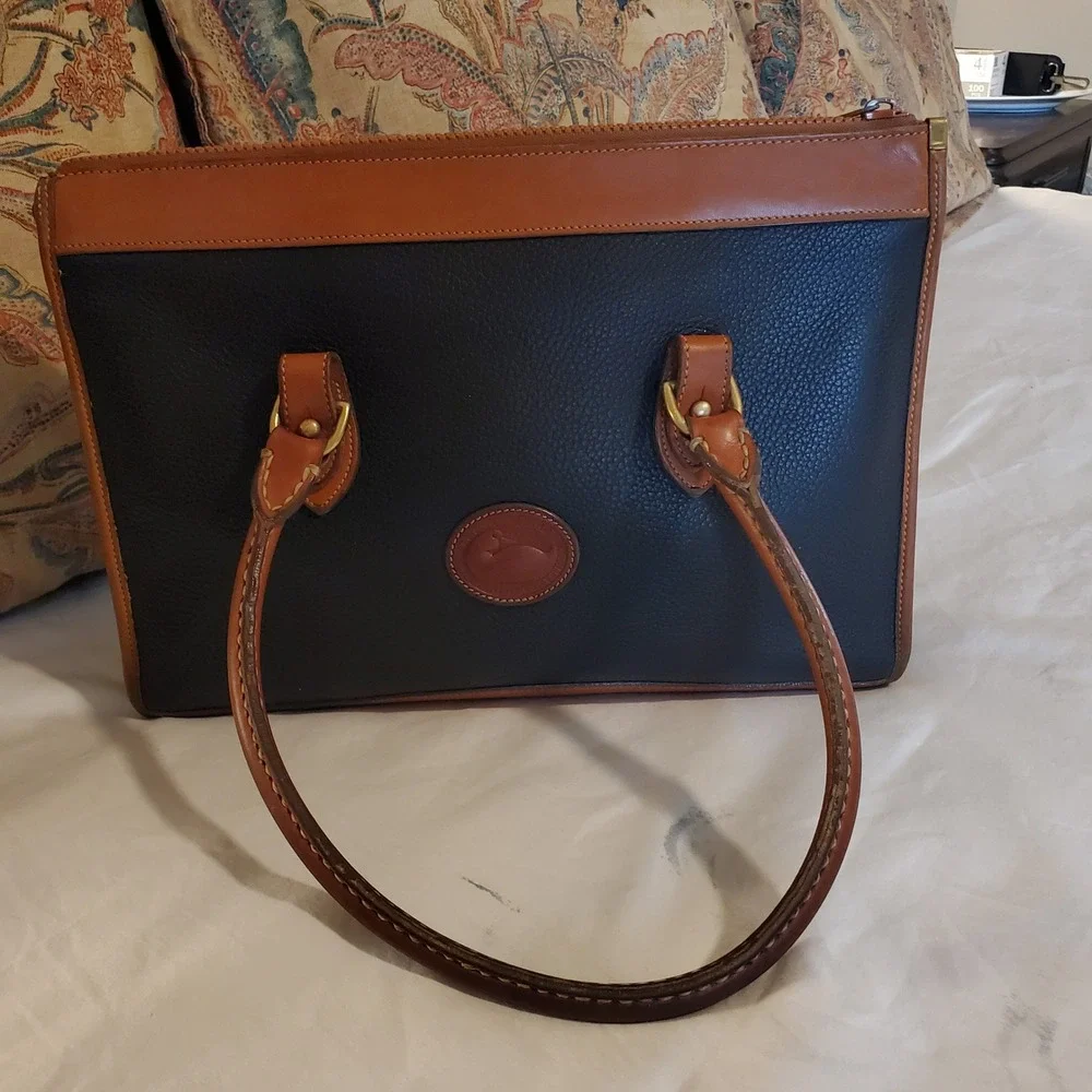 Dooney & Bourke Vintage All Weather Leather Tote Navy Blue Tan Brass Duck Fob